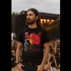Man wearing a black t-shirt with 'Alice in Chains' design at a concert. AIC503S, AIC503M, AIC503L, AIC503XL, AIC503XXL, AIC503XXXL, AIC503XXXXL, AIC503XXXXXL