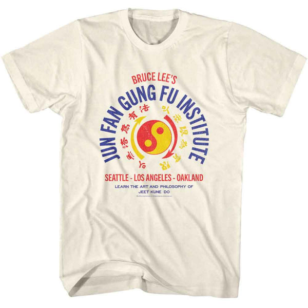 Beige t-shirt with Bruce Lee's Jun Fan Gung Fu Institute logo on a white background