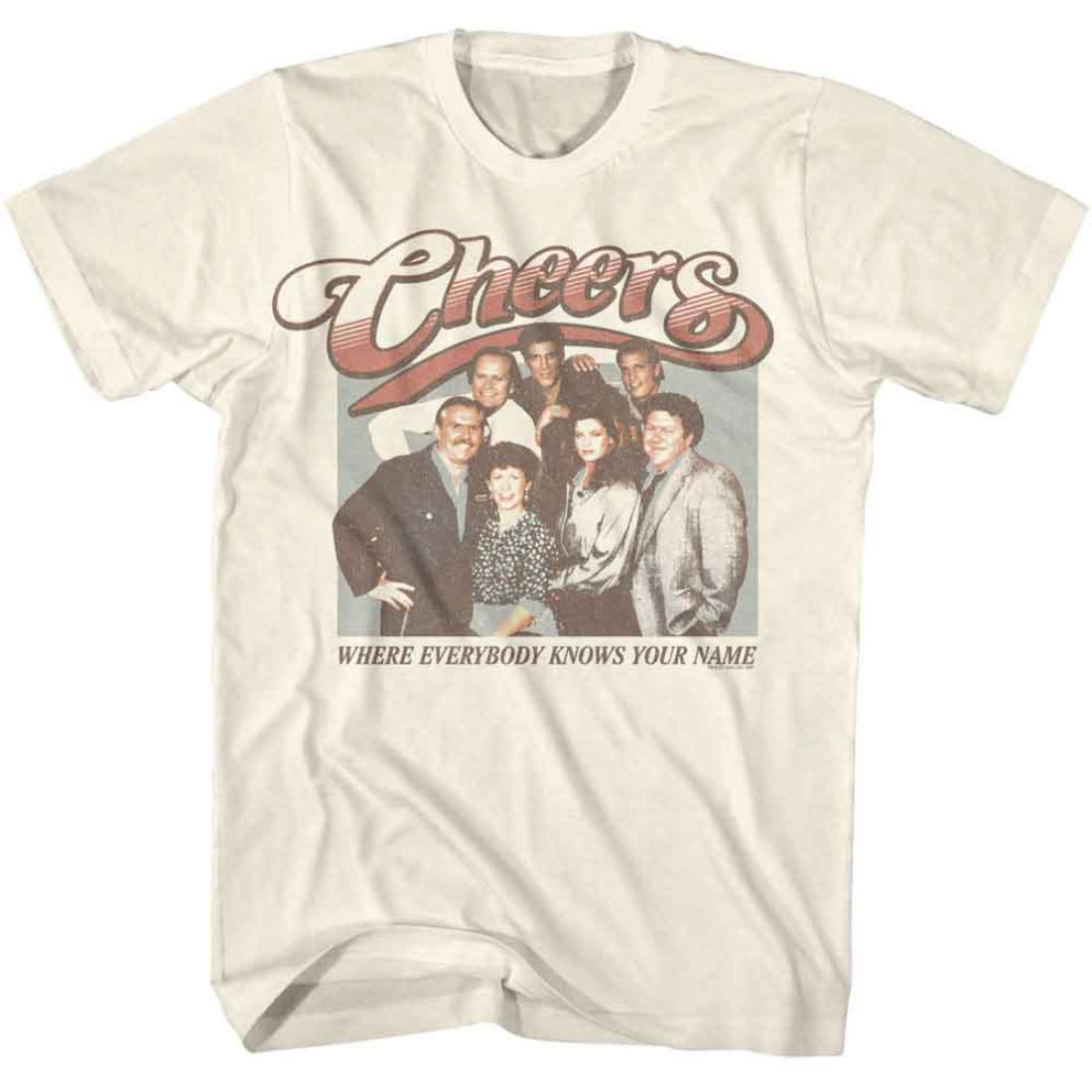 Beige t-shirt with 'Cheers' graphic featuring characters and text on a white background