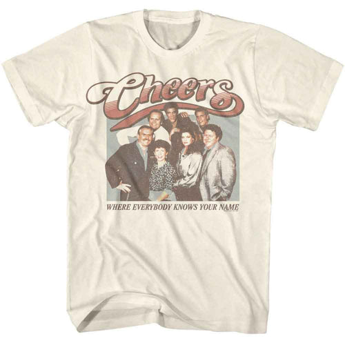 Beige t-shirt with 'Cheers' graphic featuring characters and text on a white background