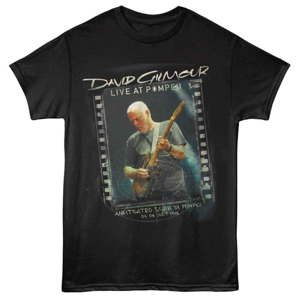 Black t-shirt with a graphic of a man playing guitar and text 'David Gilmour Live at Pompeii' on a white background.