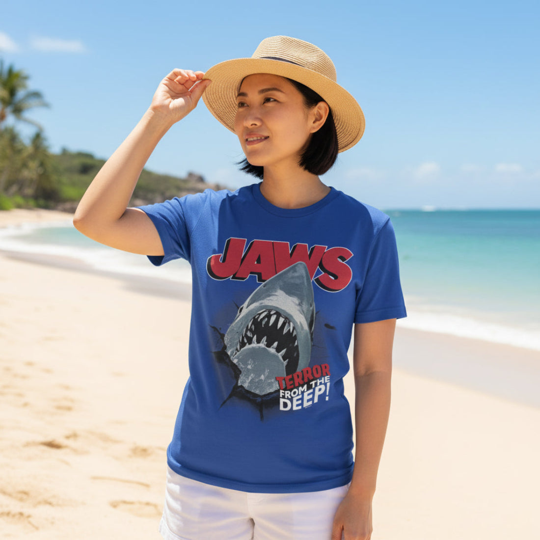 Blue t-shirt with 'JAWS' shark graphic and text  JAW5566S, JAW5566M, JAW5566L, JAW5566XL, JAW5566XXL, JAW5566XXXL, JAW5566XXXXL, JAW5566XXXXXL