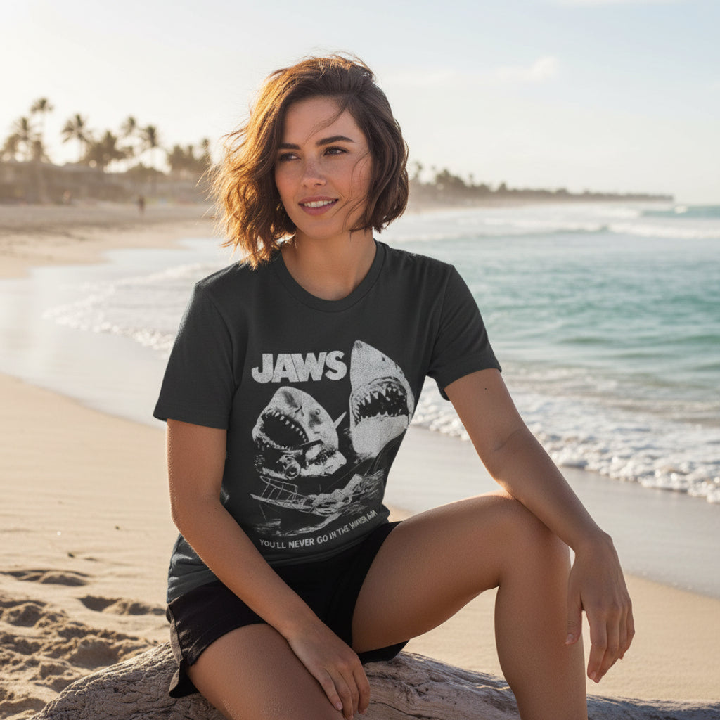 Black t-shirt with 'JAWS' graphic and text JAW5573S, JAW5573M, JAW5573L, JAW5573XL, JAW5573XXL