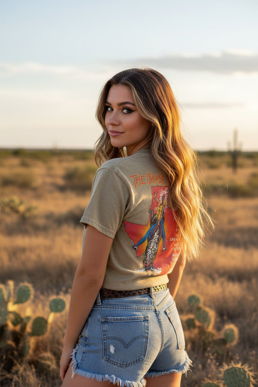 woman wearing Iron Maiden t-shirt with graphic design and text on a beige background MADN554S, MADN554M, MADN554L, MADN554XL, MADN554XXL