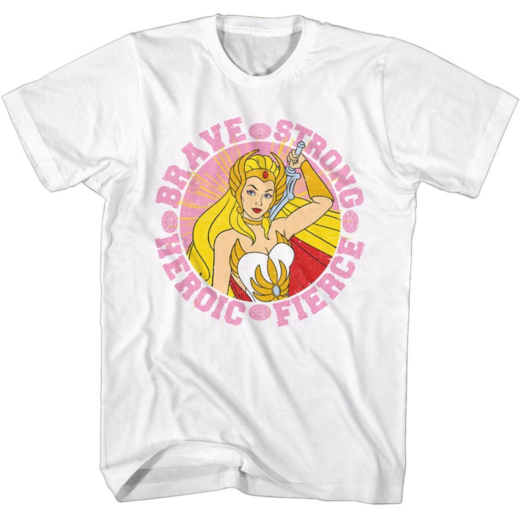 White She Ra t-shirt with superheroine graphic and 'Brave Strong Heroic Fierce' text on a white background