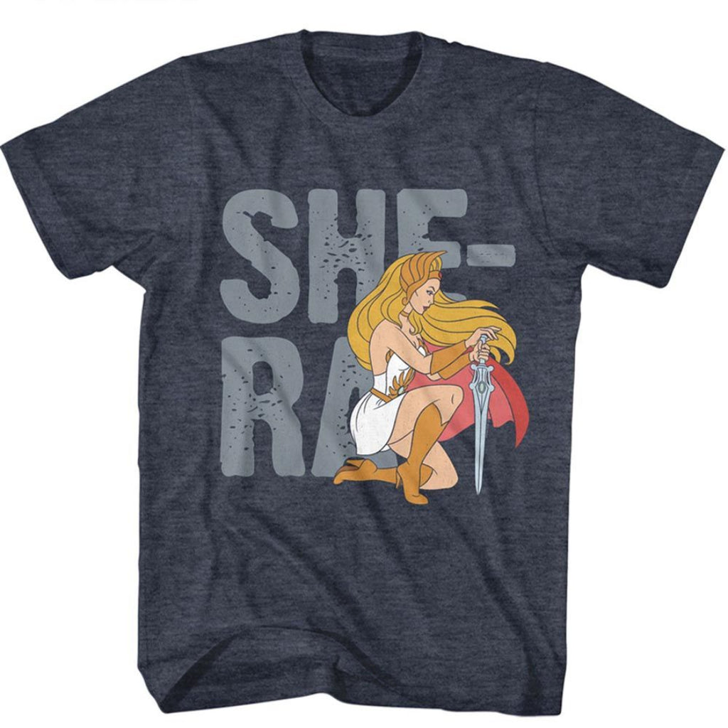 Navy blue t-shirt with She-Ra graphic and 'SHE-RA' text on a white background