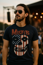 Man wearing a 'Misfits' t-shirt with a skull design at an outdoor event. MSFJ503S, MSFJ503M, MSFJ503L, MSFJ503XL, MSFJ503XXL, MSFJ503XXXL, MSFJ503XXXXL, MSFJ503XXXXXL