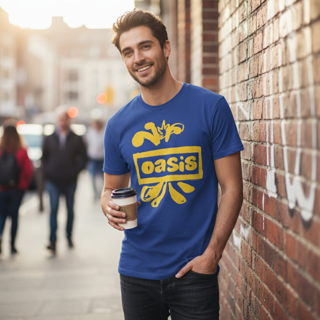 Man wearing Blue t-shirt with yellow 'oasis' logo on a white background OAS525S, OAS525M, OAS525L, OAS525XL, OAS525XXL, OAS525XXXL, OAS525XXXXL, OAS525XXXXXL