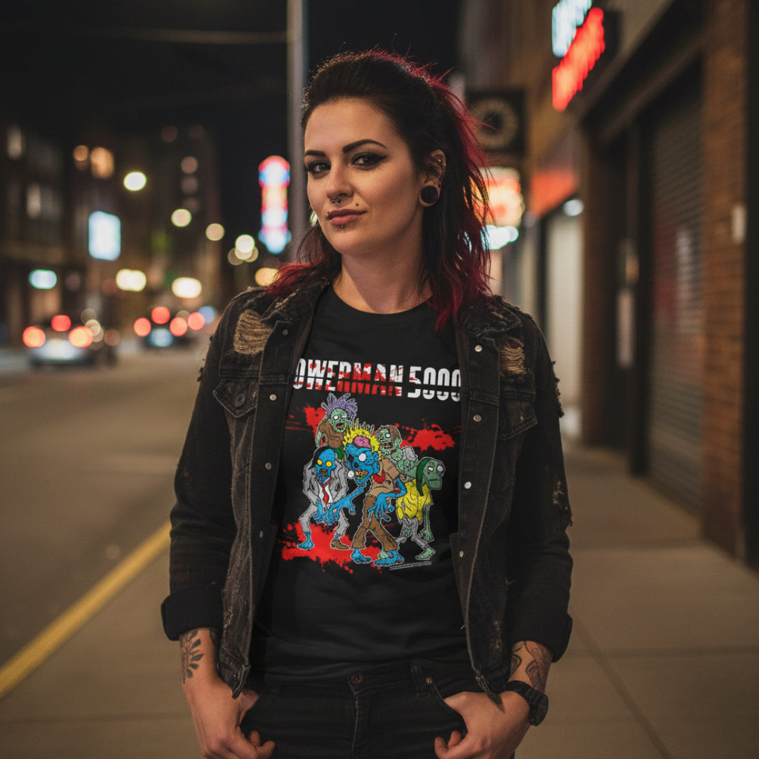 Woman wearing Black t-shirt with colorful graphic design and 'Powerman 5000' text PMF502S, PMF502M, PMF502L, PMF502XL, PMF502XXL, PMF502XXXL, PMF502XXXXL, PMF502XXXXXL