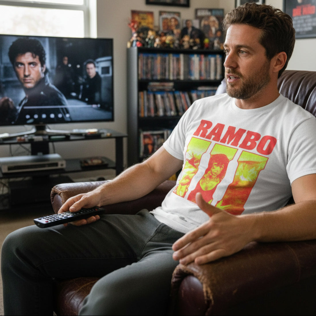 MAN WEARING White t-shirt with 'RAMBO III' graphic design  RAM5112S, RAM5112M, RAM5112L, RAM5112XL, RAM5112XXL, RAM5112XXXL, RAM5112XXXXL, RAM5112XXXXXL