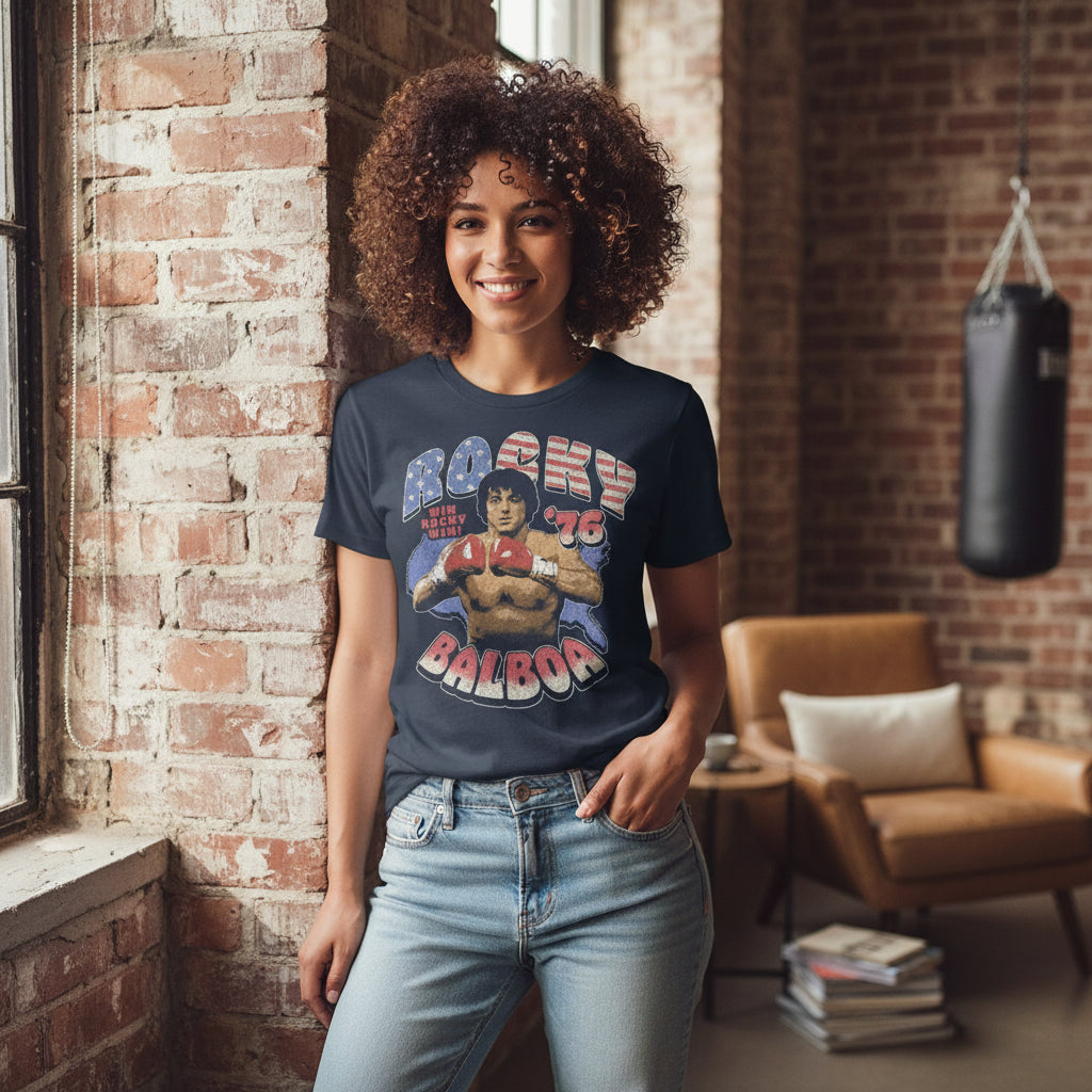 Woman wearing Navy blue t-shirt with Rocky Balboa graphic and text RK5651S, RK5651M, RK5651L, RK5651XL, RK5651XXL, RK5651XXXL, RK5651XXXXL, RK5651XXXXXL