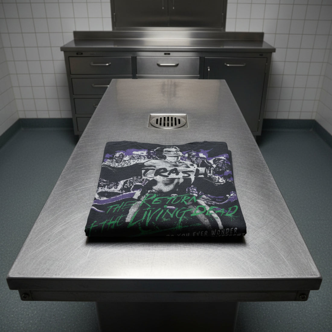 RETURN OF THE LIVING DEAD TRASH SHIRT FOLDED ON AN AUTOPSY TABLE RLD535S, RLD535M, RLD535L, RLD535XL, RLD535XXL