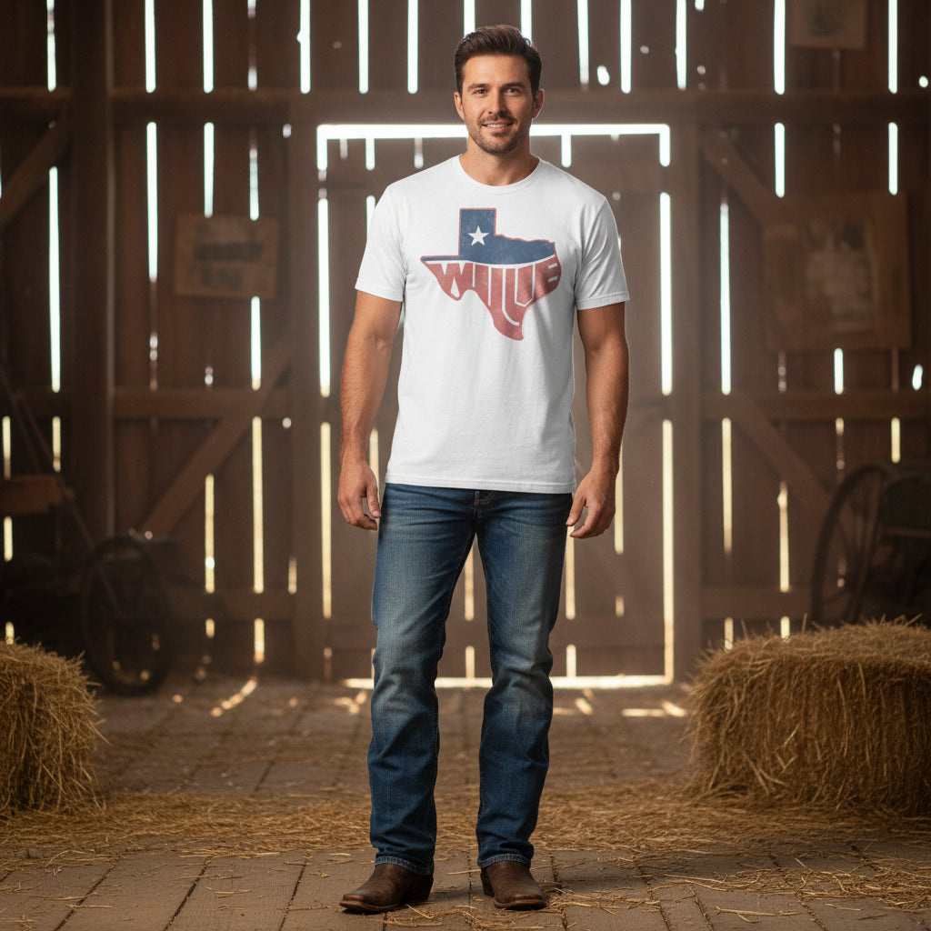 Man wearing white t-shirt with a Texas-shaped design and 'Wille' text on a white background WLN535_MALE_MOCKUPS, WLN535_MALE_MOCKUPM, WLN535_MALE_MOCKUPL, WLN535_MALE_MOCKUPXL, WLN535_MALE_MOCKUPXXL, WLN535_MALE_MOCKUPXXXL, WLN535_MALE_MOCKUPXXXXL, WLN535_MALE_MOCKUPXXXXXL
