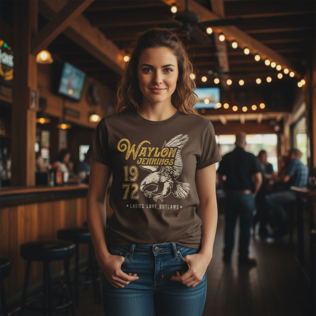 WOMAN WEARING Brown t-shirt with Waylon Jennings graphic and eagle design WYJ504S, WYJ504M, WYJ504L, WYJ504XL, WYJ504XXL, WYJ504XXXL, WYJ504XXXXL, WYJ504XXXXXL