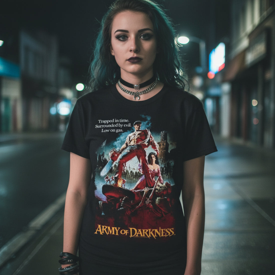 GIRL WEARING Black t-shirt with 'Army of Darkness' graphic design featuring a man and woman in a post-apocalyptic scene. AOD502S, AOD502M, AOD502L, AOD502XL, AOD502XXL, AOD502XXXL, AOD502XXXXL, AOD502XXXXXL